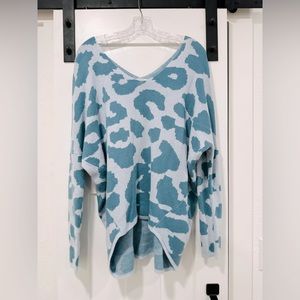 Blue cheetah print La Miel sweater.